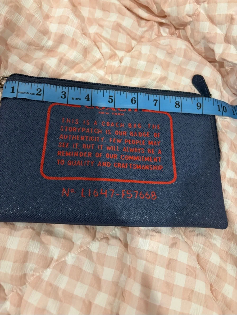 Coach Navy Wristlet with Red Logo Print